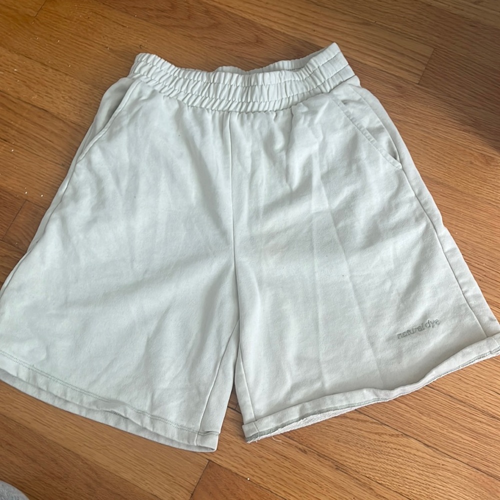 light green sweat shorts
